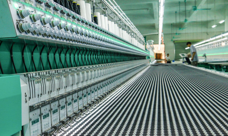 Embroidery equipment in YaFei production photographs